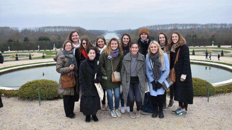 UM students and faculty members take in the beauty of the gardens at the Palace of Versailles.